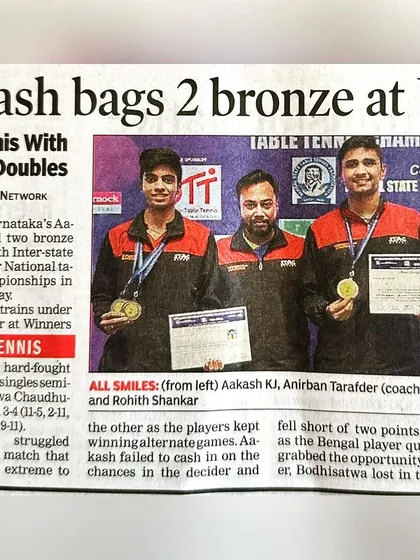 The full newspaper article from the Times of India about Aakash's double bronze win, providing details of his semi-final matches.
