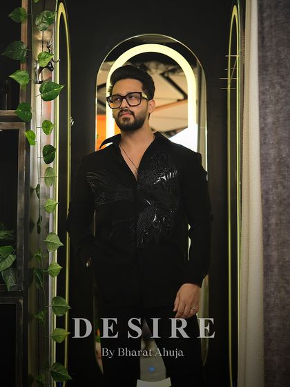 A look of pure, unadulterated confidence. The shirt is the perfect canvas for a man who is already a masterpiece.