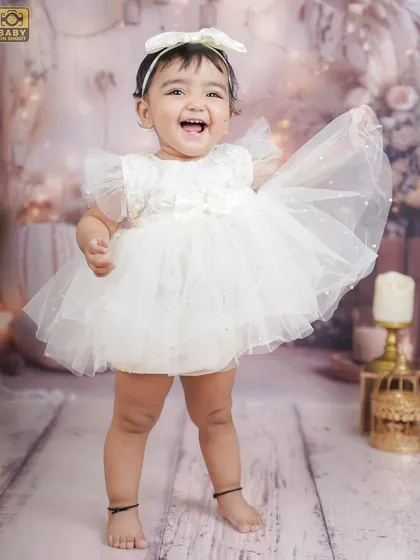 A moment of pure, dancing joy. I love capturing these spontaneous movements that show off a child's personality.