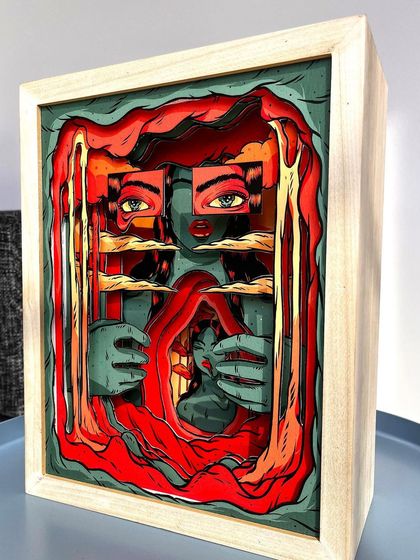 A layered paper sculpture titled 'Reflections and Perception of Self.' This piece uses multiple cut-out layers to create a three-dimensional, tunnel-like effect, exploring the different facets of identity.