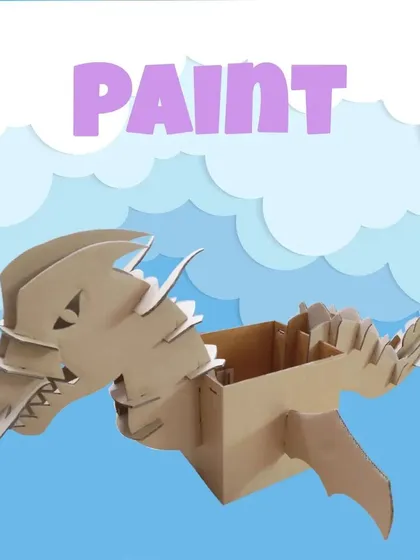 Next, we let creativity run wild with paint. Once the cardboard dragon is built, it becomes a blank canvas. I provide all the materials for kids to add color, personality, and bring their mythical creature to life.