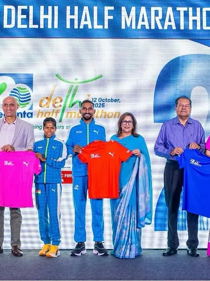 On stage for the Vedanta Delhi Half Marathon 2025 press launch. Organizing major city marathons requires professional collaboration with top sponsors and elite athletes. I handle these high-profile events to ensure a world-class experience for over 40,000 runners.