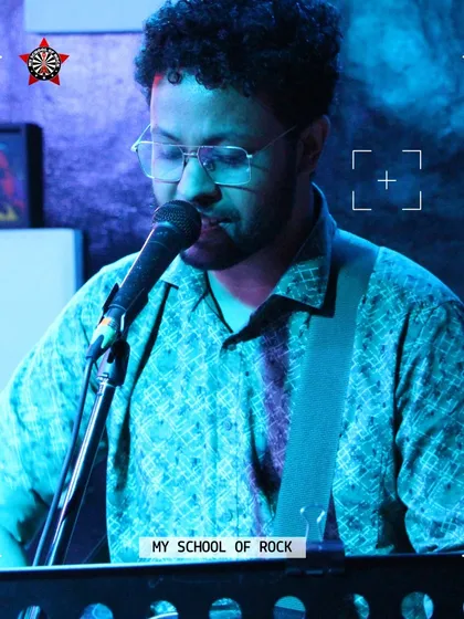 A singer-songwriter focused on his performance. Our goal is to create an environment where artists can truly connect with their music.