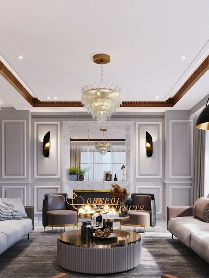 A cozy living room setup featuring a fireplace and elegant wall paneling. The design balances classic elements with modern furniture for a timeless yet comfortable feel.