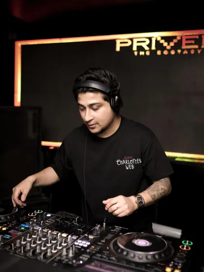Focused on the mix. Every transition and track selection is deliberate, designed to build and maintain the energy on the dance floor. This is a look at my technical process during a live set.