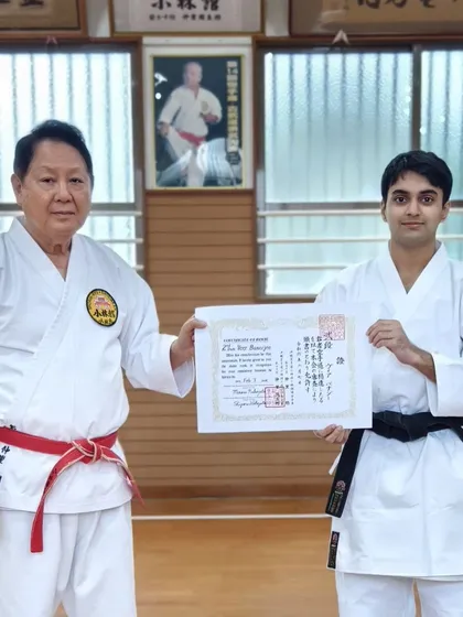 Senpai Veer Banerjee is awarded his Nidan (2nd Dan) black belt certificate in Okinawa, a reward for his persistent training.