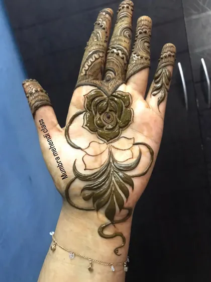 Another shot of the finished rose design. It's a versatile look that can be simple or part of a larger bridal piece.