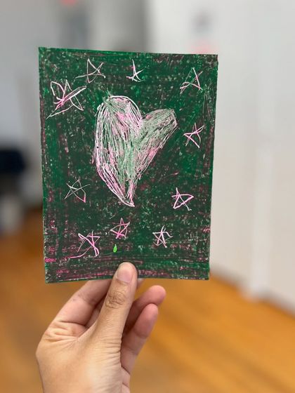 A sweet heart and stars artwork in green and pink, demonstrating a different color palette within the same sgraffito technique.