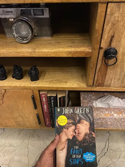 For book lovers, I keep a small collection of books like 'The Fault in Our Stars' that you can enjoy during your stay.