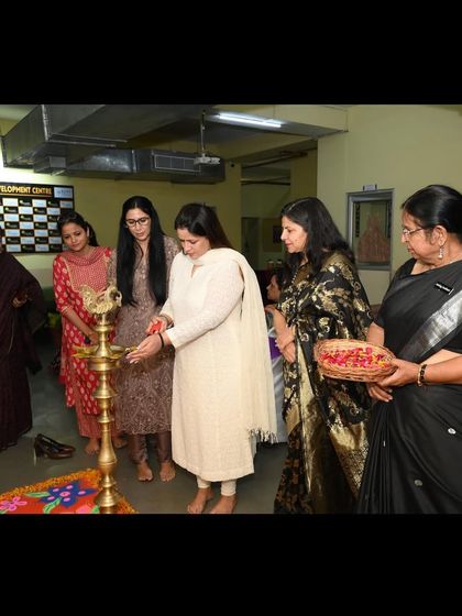 As the Chief Guest at a Pravah Skill Development Centre event, participating in the lamp lighting ceremony. Empowering women through skill development is closely linked to legal empowerment.