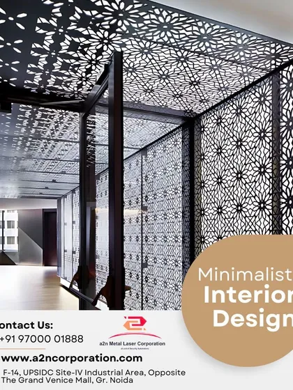 A minimalist yet impactful interior featuring floor-to-ceiling black jali screens with a geometric floral pattern. This example shows our work in a large-scale commercial or high-end residential setting, defining the space with elegance and style.