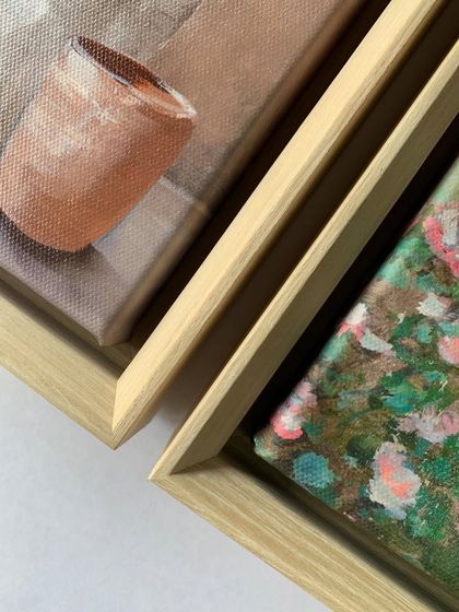 The serene artwork of Eva Watts, "Blissful Heaven" and "Untouched Beauty," is expertly framed in our premium wooden floater frames, enhancing the tranquil ambiance of the pieces.