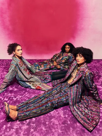 A vibrant and artistic co-ord set from the Unity Loom collection, featuring a colourful printed jacket and trousers.