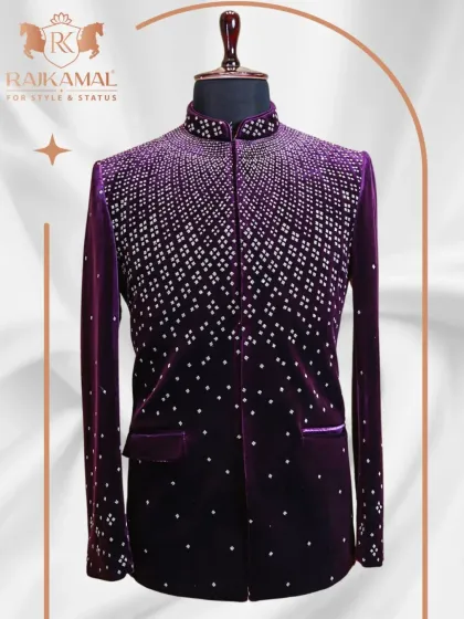 For a truly royal entrance, this deep purple velvet Jodhpuri suit is unmatched. The cascading sequin work catches the light beautifully, making it an opulent choice for a groom or anyone wanting to command attention at a grand celebration.