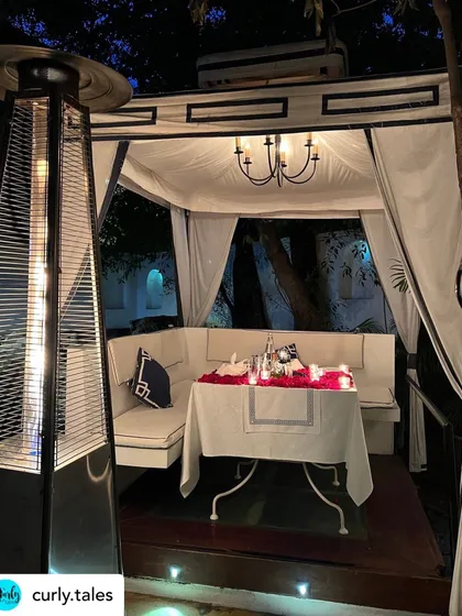 A guest's view of their private cabana, complete with a heater for cooler evenings, ensuring comfort throughout the year.