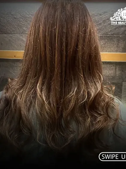A classic example of subtle highlights and lowlights. This adds beautiful, natural-looking dimension to the hair without a drastic change.