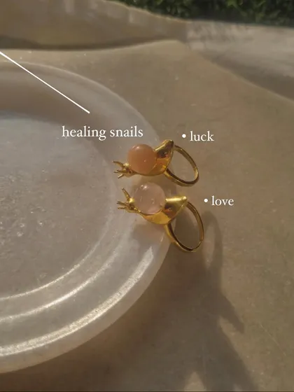 My healing 'snáil' rings in peach moonstone for luck and rose quartz for love.