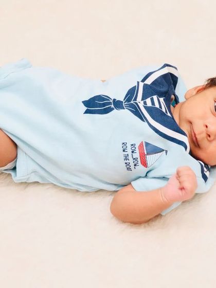 Even when they are not swaddled, I capture their personality. This little sailor is looking right at the camera, showing off his curious and alert side.