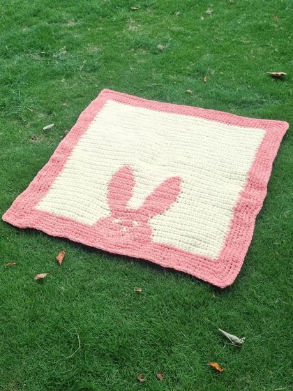 This handmade crochet blanket is a perfect, heartfelt gift for a baby shower or a newborn.