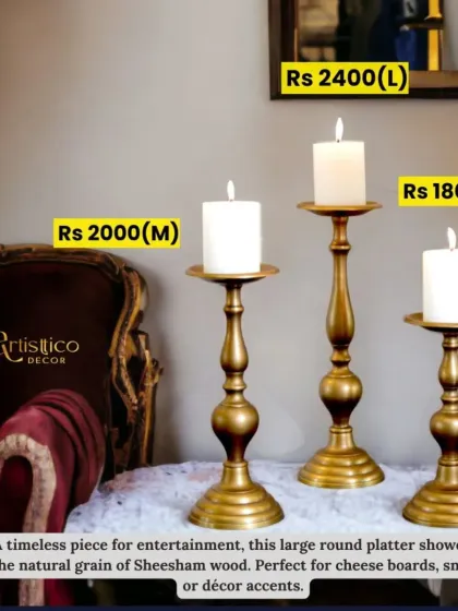 A set of three timeless candle stands in a gold finish, shown here in small, medium, and large sizes. They are perfect for creating a dynamic and elegant centerpiece on a dining table or console.