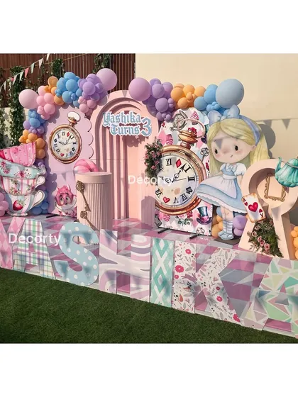 The full stage for Yashika's party, with large 3D letters spelling out her name.