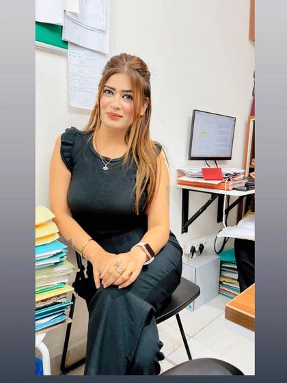 Success is the sum of small efforts, repeated day in and day out. A candid shot from my workplace, surrounded by files and the daily grind.