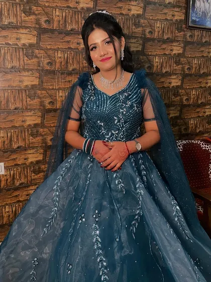 The full look, showcasing the beautiful gown and how the makeup and hair complete the elegant ensemble.