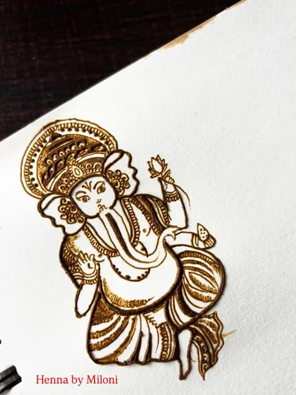 A detailed sketch of Lord Ganesha, the remover of obstacles. I often incorporate divine figures like Ganpati into bridal and festive designs for blessings.