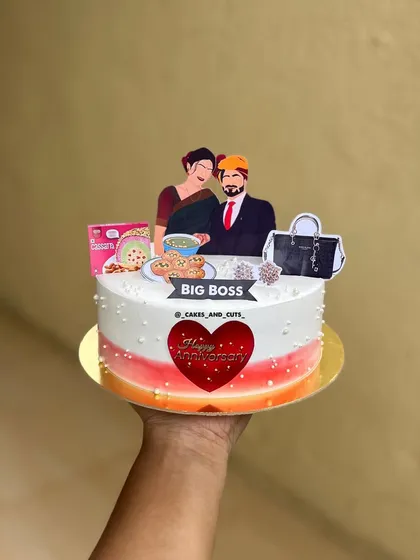 A fully customized anniversary cake with a caricature of the couple and details representing their life together.