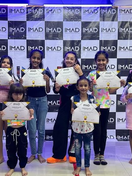 A group of our junior and senior kids' batch students celebrating together after the show.