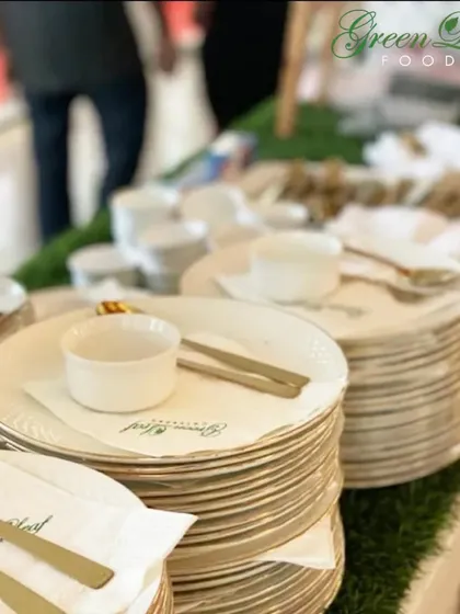 We ensure every detail is perfect, right down to the tableware. Our setup includes clean, stacked plates and neatly arranged cutlery, ready for guests to enjoy the feast.