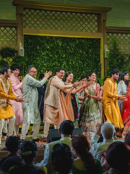 The entire family dancing together in a train formation. It's a simple and fun way to get everyone involved and moving together on stage.