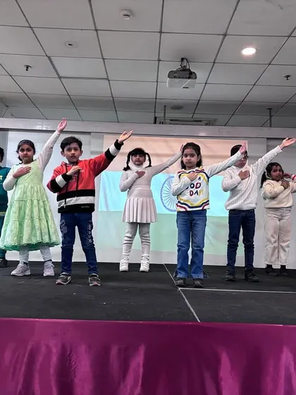 Students perform a synchronized dance to a patriotic song during our Republic Day assembly, showcasing their talent and love for the country.