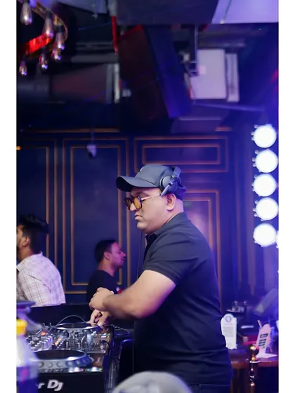 Another angle from the DJ booth, showing the setup and the club's atmosphere. I'm getting ready to drop the next big track for the dance floor.