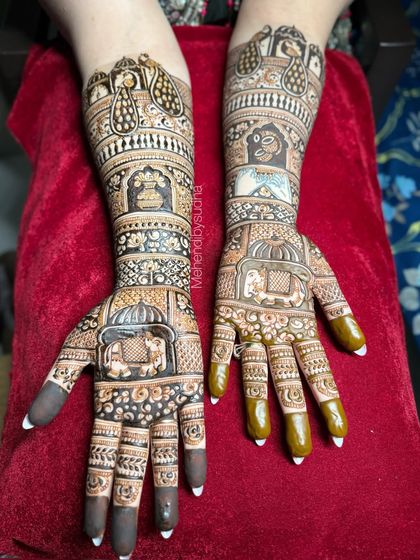 Another angle of the royal elephant design, showcasing the depth and detail in the artwork on both hands.