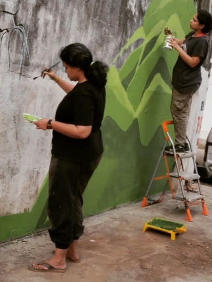 Here are some moments from the creation of the 'Stories of Water' mural. It started with awkward introductions and ended with a community of strangers and friends painting together, sharing stories, and bringing color and conversation to a public space.