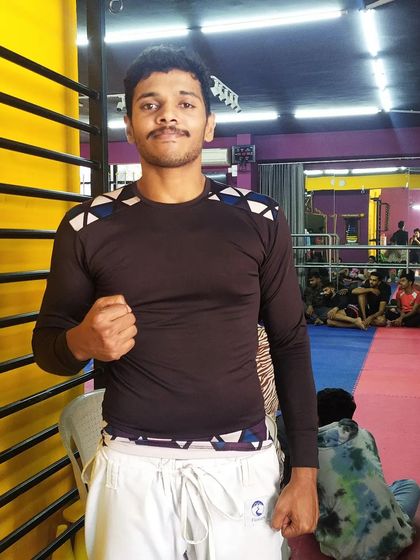 Posing with my coaches and fellow competitors after the Karnataka Open 2024. The support from your team is just as important as the work you do on the mats.