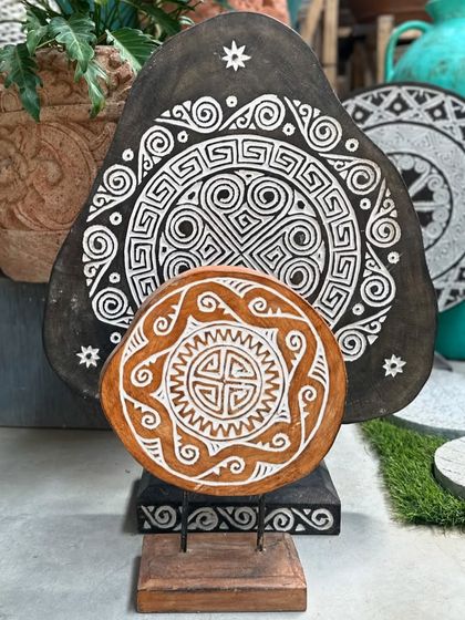 A look at our Aztec-inspired panels in two different finishes. The natural wood and white carving offers a warm, bohemian feel, while the black and white version provides a more graphic, modern statement.