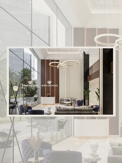 A stylized view of the Sobti Sapphire reception area, highlighting the grand scale and modern aesthetic. The design uses clean lines, reflective surfaces, and a balanced composition to create a memorable entrance.