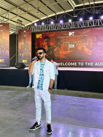 On stage hosting the auditions for MTV Roadies. It was a full-circle moment for me, going from an aspiring Roadie to hosting the show's auditions years later.