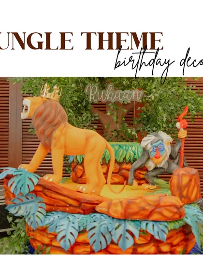 An overview of our "Jungle Theme" birthday decor. This setup features life-sized statues of Simba and Rafiki on a Pride Rock-inspired stage, creating an immersive experience.