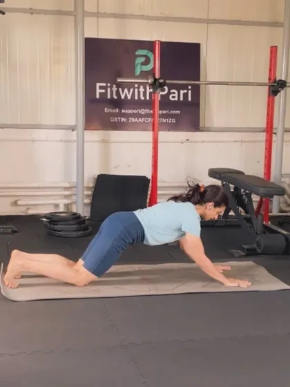 A modified push-up on the knees. I always provide modifications to ensure everyone can work at their own level and build strength safely.