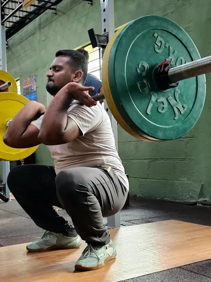 Excellent mobility is the foundation of true strength. Here, one of our members demonstrates a deep front squat, showcasing the flexibility and control we drill into every athlete. This is what proper form looks like.