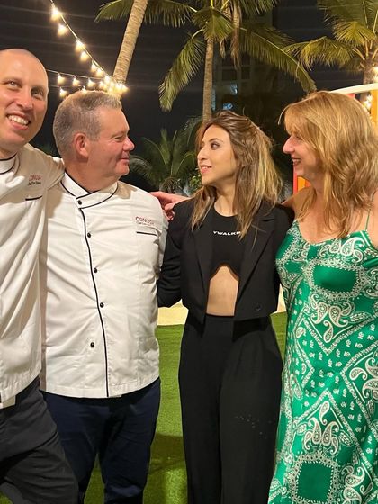 A candid moment of conversation and laughter with dear friends.