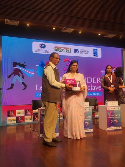 A community leader receiving an award at the conclave. We celebrate the achievements of all trans leaders.