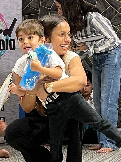 It's not just about the kids, it's about the family. I love these candid moments where parents are celebrating their little one's achievements during our certificate distribution.