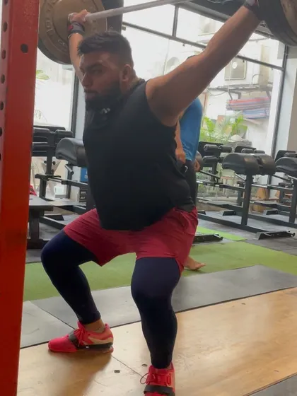 A powerful receiving position in the drop snatch. This drill builds the confidence needed to catch heavy weight overhead.