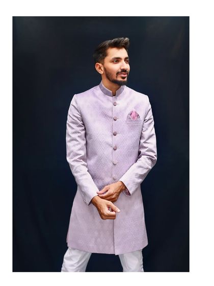Here is the full look of our popular lavender Indo-Western. Paired with white trousers, it creates a clean, sharp, and contemporary ethnic outfit.