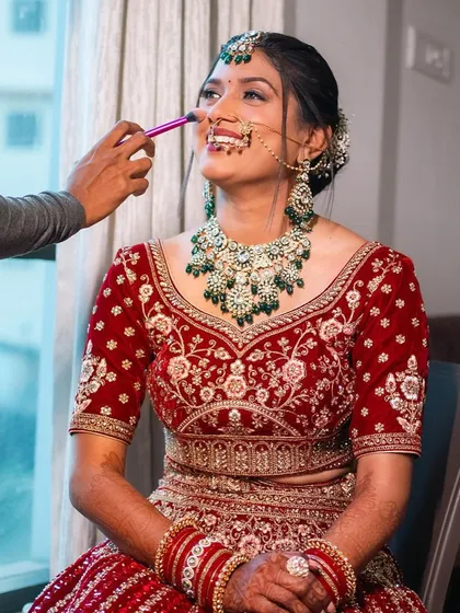 A happy moment during the makeup session. A smiling bride is the most beautiful bride.
