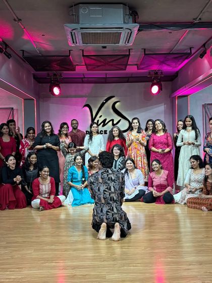 A moment of respect and gratitude between the instructor and students. These workshops are a two-way exchange of energy and knowledge.